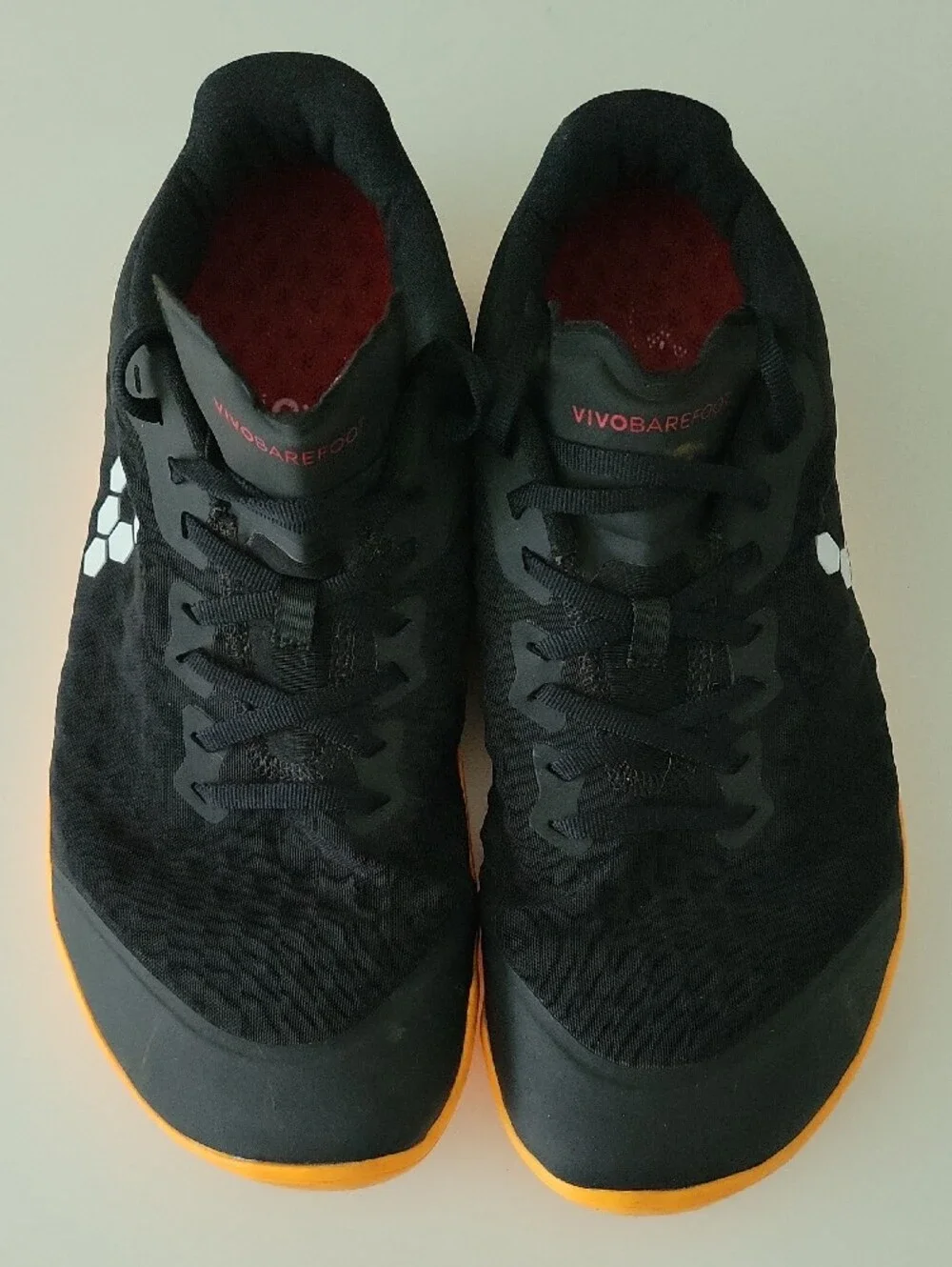 Vivo barefoot Men’s Black Athletic Shoes with Orange Sole